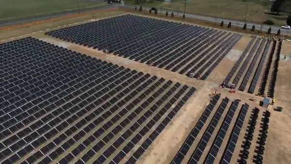 Aerial view of a PowerField Energy solar array under construction